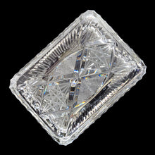 Load image into Gallery viewer, Elegant vintage cut crystal lidded cigarette box. Crafted by Bohemia Crystal, Czechoslovakia, 1970s. This box provides a decorative way to store cigarettes with the lid functioning as an ashtray. Not a smoker? Use this versatile elegant box to store playing cards, candies or trinkets. Add this statement piece to your home decor or give as a gift.

In excellent condition, no chips.

Measures 4 1/2 x 3 3/8 x 3 1/2 inches
