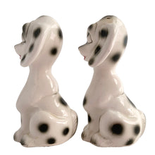 Load image into Gallery viewer, Vintage black and white Dalmatian puppy dog ceramic salt and pepper shakers with plastic stoppers. Japan 1960s. Add these adorable and highly collectible kitschy shakers to your collection!

In excellent vintage condition, no chips/cracks/repairs.

Measures 2 1/8 x 2 x 4 inches
