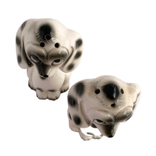 Load image into Gallery viewer, Vintage black and white Dalmatian puppy dog ceramic salt and pepper shakers with plastic stoppers. Japan 1960s. Add these adorable and highly collectible kitschy shakers to your collection!

In excellent vintage condition, no chips/cracks/repairs.

Measures 2 1/8 x 2 x 4 inches
