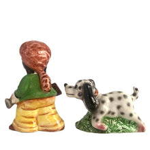 Load image into Gallery viewer, Rare, adorable hand painted young Davey Crockett with Dalmatian hunting dog salt and pepper shakers. Crafted in Japan, 1950s. A sweet kitschy shaker set for your Crockett or shaker collection!

In excellent vintage condition, no chips, with corks.

Davey measures 2 1/4 x 1 3/4 x 3 5/8 inches tall

Dog measures 3 3/8 x 1 /4 x 2 inches
