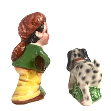 Load image into Gallery viewer, Rare, adorable hand painted young Davey Crockett with Dalmatian hunting dog salt and pepper shakers. Crafted in Japan, 1950s. A sweet kitschy shaker set for your Crockett or shaker collection!

In excellent vintage condition, no chips, with corks.

Davey measures 2 1/4 x 1 3/4 x 3 5/8 inches tall

Dog measures 3 3/8 x 1 /4 x 2 inches
