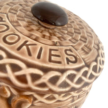 Load image into Gallery viewer, Close-up of ESD Lefton cookie jar lid and braided rim — basketweave and interlaced rope texture detail, dark knob, crazing and lid repair crack visible
