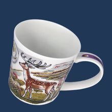 Load image into Gallery viewer, Delightful Enchantment bone china mug featuring deer in a whimsical woodland scene. Designed by Gillian Martin for Dunoon, England. A lovely collectible mug for your favourite hot beverage.

In excellent condition, no chips/cracks/repairs.

Measures 3 1/2 x 3 1/2 inches

Capacity 10 ounces
