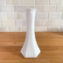 Load image into Gallery viewer, Vintage diamond hobnail patterned six panel milk glass bud vase. Crafted by the E.O. Brody Company, USA, circa 1960s. Any flower arrangement will look beautiful in this simple and elegant classic. The perfect addition to your vintage, farmhouse, shabby chic, cottage core, wedding and bridal decor. In excellent condition, free from chips or cracks. Measures 2 1/2 x 6 inches
