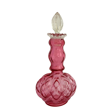 Lovely vintage Diamond Optic Ruby Overlay cologne bottle with clear crimped collar and stopper. Crafted by the Fenton Art Glass Company,  1942 - 1948. A beautiful piece for any glass collector!  The bottle is in excellent condition, free from chips. The stopper is in used vintage condition with chipping to the bottom.  Measures 3 3/4 x 8 3/4 inches