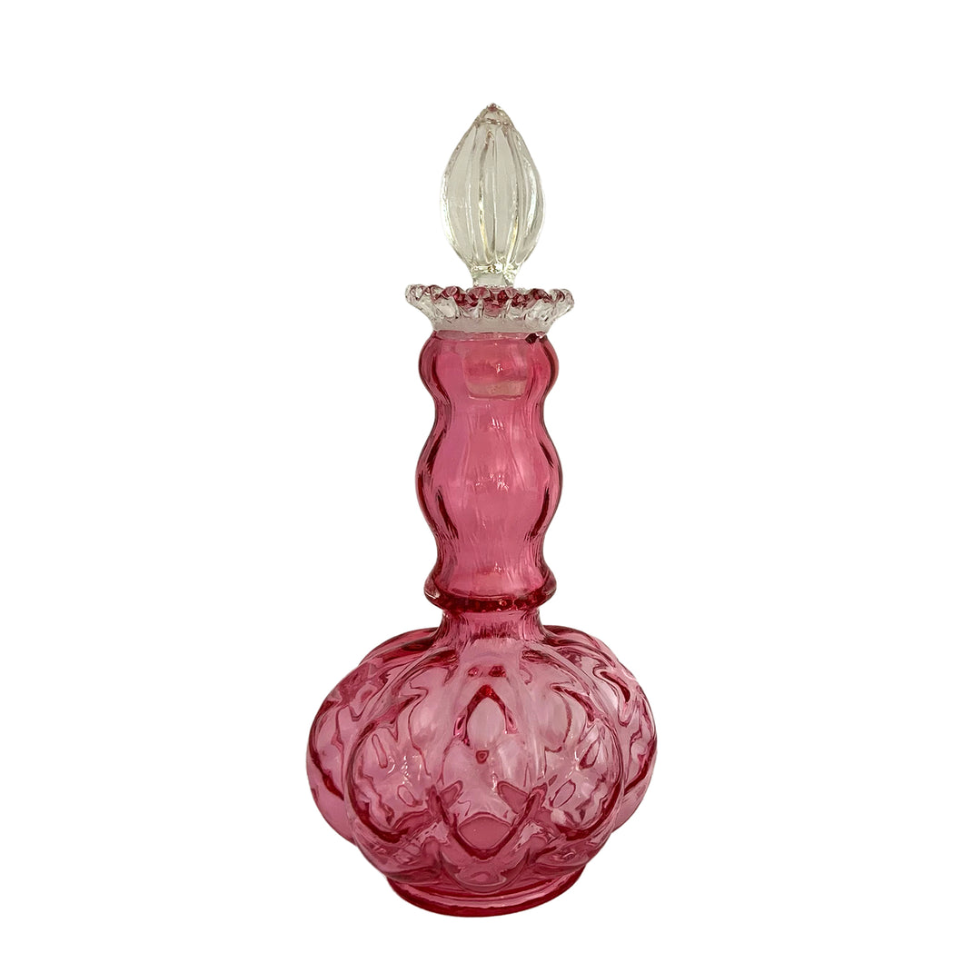 Lovely vintage Diamond Optic Ruby Overlay cologne bottle with clear crimped collar and stopper. Crafted by the Fenton Art Glass Company,  1942 - 1948. A beautiful piece for any glass collector!  The bottle is in excellent condition, free from chips. The stopper is in used vintage condition with chipping to the bottom.  Measures 3 3/4 x 8 3/4 inches