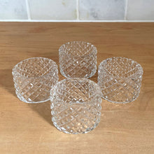 Load image into Gallery viewer, Set of four vintage diamond pattern round glass napkin rings. Crafted in Czechoslovakia, 1960s. Add sparkle to your tablescape with these classic napkin rings.

In excellent condition, no chips. In original box.

Measures 2 x 1 1/4 inches
