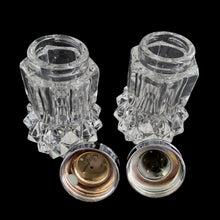 Load image into Gallery viewer, Top view of shakers and lids pair of vintage "Diamond Point" clear glass salt and pepper shakers
