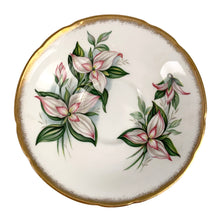 Load image into Gallery viewer, Vintage Dogwood fine bone china teacup and saucer featuring hand painted flowers in shades of pink, gray and green with brush gold gilt trim. Crafted by Paragon, England, 1960s. A lovely way to enjoy a cuppa tea!

In excellent condition, no chips, cracks or repairs. Maker&#39;s mark on the bottom.

Measures 3 3/4 x 2 3/4 inches | Saucer measures 5 inches
