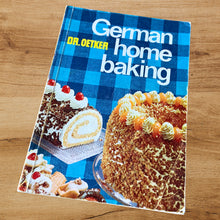 Load image into Gallery viewer, Vintage Dr. Oetker German Home Baking, softcover cookbook. Its 179 pages are filled with yummy recipes along with many colour and black and white photographs. Published by Ceres-Verlag Rudolf-August Oetker KG Bielefeld, Germany, 1970. In great vintage condition with wear on the spine and normal age-related page yellowing. There is a written inscription on the first interior page.
