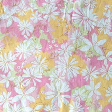 Load image into Gallery viewer, Vintage Dream Garden flat twin sheet featuring a flower power pattern in shades of pink, yellow, green and white. 50% polyester / 50% cotton. Crafted by St. Mary’s, USA, 1970/71. A beautiful addition to your retro boho bedding decor, or repurpose for crafting.

In as found vintage condition.

Sheet #1 has one small hole and a 2-1/2 inch tear near the bottom of the sheet that been poorly mended.

Sheet #2 has two small holes. Please see photos.

Measures 72 x 104 inches
