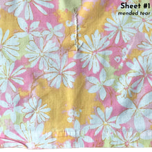 Load image into Gallery viewer, Vintage Dream Garden flat twin sheet featuring a flower power pattern in shades of pink, yellow, green and white. 50% polyester / 50% cotton. Crafted by St. Mary’s, USA, 1970/71. A beautiful addition to your retro boho bedding decor, or repurpose for crafting.

In as found vintage condition.

Sheet #1 has one small hole and a 2-1/2 inch tear near the bottom of the sheet that been poorly mended.

Sheet #2 has two small holes. Please see photos.

Measures 72 x 104 inches
