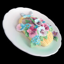 Load image into Gallery viewer, Angled view of vintage ESD Lefton 3D floral wall plaque showing depth of high-relief petal work and hand-painted detail, Japan, 1950s
