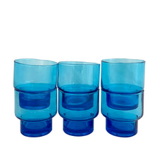 Load image into Gallery viewer, Set of 6 vintage Italian electric blue stackable glasses, front view showing three stacked pairs in a row with two glasses per stack, displaying the stepped stacking profile and cobalt blue base
