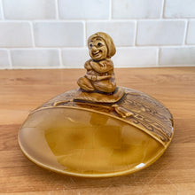 Load image into Gallery viewer, vintage cookie jar of figural elephant features a turbin wearing gentleman sitting on a pillow riding on top which forms the lid&#39;s finial. adorable and the expression on the rider&#39;s face is sassy! The elephant is beautifully decorated in an East Indian motif. Crafted by Noritake, Japan for Giftcraft export. In outstanding condition, free from chips/cracks/wear. We believe this is new old stock. Original sticker present and the bottom has the stamped maker&#39;s mark. Measures 7 1/2 x 5 1/2 x 9 3/4 inches
