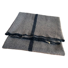 Load image into Gallery viewer, Stay toasty warm with this vintage Elizabeth Line gray wool blanket featuring a black stripe and black edge stitching. Crafted by Renfrew Textiles, Canada, circa 1940s/50s for Canada&#39;s Department of National Defence. A wonderful piece of Canadian army and military history!

In excellent vintage condition. No tears/stains.

Measures 54 x 80 inches
