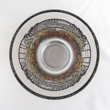 Load image into Gallery viewer, Vintage retro Coca-Cola promotional glass featuring a colourful flower power graphic illustration in an ombre of red, orange and yellow outlined in black. The word &quot;Enjoy&quot; sits above the distinctive Coke logo in a oval medallion reminiscent of a stained glass window. Makers mark is impressed on the bottom, however, we&#39;re unable to assign it to a specific maker.   In excellent, like new condition, free from chips.
