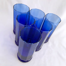 Load image into Gallery viewer, Vintage set of six cobalt blue &quot;Essex&quot; pattern glass tumblers with their distinctive ten panels and indented foot. Manufactured by Anchor Hocking Glass, USA, between 2003 - 2008. Perfect for serving your favourite beverage and adding a pop of colour to your tablescape!  In excellent condition, free from chips.  Measures 3 x 6 1/4 inches
