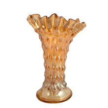 Load image into Gallery viewer, Opposite side view of antique Fenton Rustic marigold carnival glass swung vase styled in situ, showing scale and decorative context
