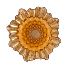 Load image into Gallery viewer, Overhead view of Fenton Rustic marigold carnival glass swung vase showing the flared, irregular rim and iridescent interior
