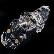 Load image into Gallery viewer, This vintage figural crystal glass seated lion pipe rest is sure to be a conversation starter. Crafted by Art Vannes, France, circa 1960s/70s. With its elegant and powerful presence, this stunning lion may be used as intended, or as a paperweight and candy dish. Whichever your choice, this piece will add an extra touch of sophistication to any corner of your room. In excellent condition, free from chips/wear. Maker&#39;s mark on the bottom. Measures 6 3/4 x 2 5/8 x 4 1/2 inches
