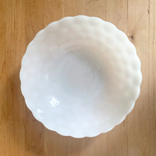 Load image into Gallery viewer, Oh so cottagey, vintage Fire-King Bubble milk glass round vegetable bowl featuring a bubble exterior and starburst bottom. Crafted by Anchor Hocking, USA, 1934 - 1965. Perfect for serving your favourite dish!

In excellent condition, no chips or cracks.

Measures 8 1/4 x 2 5/8 inches
