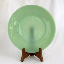 Load image into Gallery viewer, Vintage mid-century Fire-King &quot;Jane Ray&quot; pressed glass jadeite dinner plate with ribbed border detail. Produced by the Anchor Hocking Glass Company, USA, between 1945 - 1963. These plates are collectible and suit a number of decor styles.   In excellent condition, free from chips/cracks/repairs. Maker&#39;s mark present on the bottom of each piece, see photos.  Measures 9 1/8 inches

