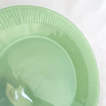 Load image into Gallery viewer, Vintage mid-century Fire-King &quot;Jane Ray&quot; pressed glass jadeite dinner plate with ribbed border detail. Produced by the Anchor Hocking Glass Company, USA, between 1945 - 1963. These plates are collectible and suit a number of decor styles.   In excellent condition, free from chips/cracks/repairs. Maker&#39;s mark present on the bottom of each piece, see photos.  Measures 9 1/8 inches
