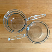 Load image into Gallery viewer, Vintage Flameware clear glass double boiler no. 6283-U1 1/2 QT with glass lid 6283-C C-18. Crafted by PYREX, USA, between 1936 - 1979. The absolute best way to melt chocolate, make creamy smooth hollandaise sauce or prepare custards!

In excellent condition, no chips. Maker&#39;s mark on each piece.

Measures 12 x 6 1/2 x 7 1/2 inches (incl. handle)
