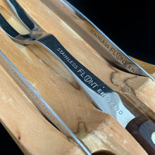 Load image into Gallery viewer, This vintage Flint hollow ground stainless steel three piece cutlery carving knife set is the perfect addition to any kitchen. Crafted by Ekco in England. The cutlery fits nicely into a beautiful hardwood block created by Overton Originals for Ecko. This gorgeous set from the 1950s, remains unused and in excellent condition. Make carving time a pleasure with this stunning vintage set!  The box shows significant wear.   
