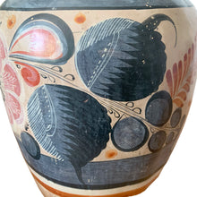 Load image into Gallery viewer, A stunning example of vintage Tonala folk art pottery, this unique hand painted pitcher or jug features whimsical floral and fauna in shades of burnt orange, rose and charcoal gray on a tan ground. Signed MEXICA 1960s era. A beautiful one-of-a-kind piece to enhance your home&#39;s decor!


In good vintage condition, no chips/cracks/repairs, age-related wear/patina.

Measures approximately 6 x 6 x 13 3/8 inches
