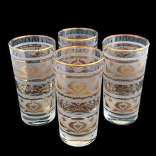 Load image into Gallery viewer, Set of four, vintage mid-century highball cocktail glasses featuring 22kt gold florals on frosted panels with gold rims. Crafted by Dominion Glass, Canada, 1960s/70s. These glasses were literally is everyone's rec rooms in the 60s and 70s and are perfect for any occasion or cocktail!

In excellent condition, no chips.

Measures 2 3/4 x 5 1/2 inches

Capacity 10 ounces
