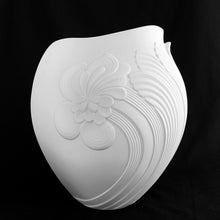 Load image into Gallery viewer, Vintage white bisque flower vase, 0327, featuring an embossed Art Nouveau flower and leaf plume with smooth rim. Designed by M. Frey for Kaiser, Germany, 1980s. This delicate ovoid shaped vase will look stunning in any setting!

In excellent condition, no chips/cracks/repairs. Maker&#39;s mark on bottom.

Measures 8 1/4 x 7 x 8 7/8 inches
