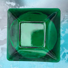 Load image into Gallery viewer, This forest green square glass ashtray was manufactured by the Anchor Hocking Glass Company in the USA. Circa 1957 - 1965.  In excellent condition free from chips or cracks.  Measuring 3 3/8 x 3 3/8 inches   
