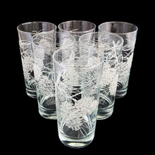 Load image into Gallery viewer, Set of six vintage highball cocktail glasses decorated with raised enamel frosted pinecones that give off a lovely sparkle. Crafted by Libbey St. Clair, USA, 1960s. These glasses are sure to add a festive flare to your Christmas and winter time cocktails!

In excellent condition, no chips.

Measures 2 3/4 x 5 3/8 inches

Capacity 12 ounces
