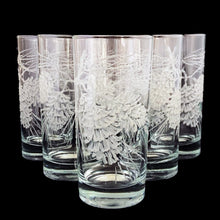 Load image into Gallery viewer, Set of six vintage highball cocktail glasses decorated with raised enamel frosted pinecones that give off a lovely sparkle. Crafted by Libbey St. Clair, USA, 1960s. These glasses are sure to add a festive flare to your Christmas and winter time cocktails!

In excellent condition, no chips.

Measures 2 3/4 x 5 3/8 inches

Capacity 12 ounces
