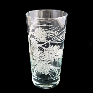 Set of six vintage highball cocktail glasses decorated with raised enamel frosted pinecones that give off a lovely sparkle. Crafted by Libbey St. Clair, USA, 1960s. These glasses are sure to add a festive flare to your Christmas and winter time cocktails!

In excellent condition, no chips.

Measures 2 3/4 x 5 3/8 inches

Capacity 12 ounces