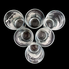 Load image into Gallery viewer, Set of six vintage highball cocktail glasses decorated with raised enamel frosted pinecones that give off a lovely sparkle. Crafted by Libbey St. Clair, USA, 1960s. These glasses are sure to add a festive flare to your Christmas and winter time cocktails!

In excellent condition, no chips.

Measures 2 3/4 x 5 3/8 inches

Capacity 12 ounces
