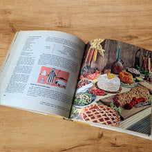 Load image into Gallery viewer, Vintage The General Foods Kitchens Cookbook, hardcover cookbook. Its 436 pages are filled with yummy recipes along with many colour photographs and illustrations. Published by Random House, USA, 1959. In great vintage condition with a crack in the spine on the interior and normal age-related page yellowing. No jacket cover.
