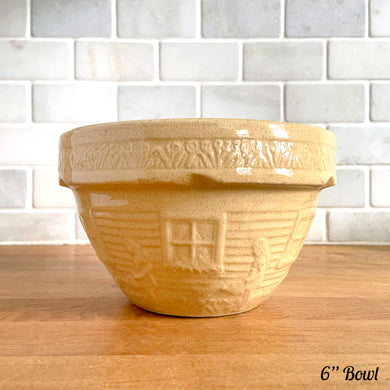 Rare find! Vintage early 20th century yellow ware 1 QT, 6 inch stoneware mixing bowl featuring a homestead scene of girl with watering can. Crafted by Robinson Ransbottom, USA, 1930s. A well-crafted piece of stoneware offering a nostalgic vibe to your farmhouse or cottage kitchenware and decor!

In excellent condition, no chips/cracks/repairs, age-related crazing. Marked 