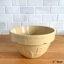 Load image into Gallery viewer, Rare find! Vintage early 20th century yellow ware 1 QT, 6 inch stoneware mixing bowl featuring a homestead scene of girl with watering can. Crafted by Robinson Ransbottom, USA, 1930s. A well-crafted piece of stoneware offering a nostalgic vibe to your farmhouse or cottage kitchenware and decor!

In excellent condition, no chips/cracks/repairs, age-related crazing. Marked &quot;166-6 U.S.A.
Measures 6 1/4 x 3 3/4 inches
