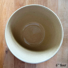Load image into Gallery viewer, Rare find! Vintage early 20th century yellow ware 1 QT, 6 inch stoneware mixing bowl featuring a homestead scene of girl with watering can. Crafted by Robinson Ransbottom, USA, 1930s. A well-crafted piece of stoneware offering a nostalgic vibe to your farmhouse or cottage kitchenware and decor!

In excellent condition, no chips/cracks/repairs, age-related crazing. Marked &quot;166-6 U.S.A.
Measures 6 1/4 x 3 3/4 inches
