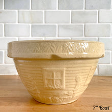Load image into Gallery viewer, Rare find! Vintage early 20th century yellow ware mixing bowl featuring a homestead scene of girl with watering can. Crafted by Robinson Ransbottom, USA, 1930s. A well-crafted piece of stoneware offering a nostalgic vibe to your farmhouse or cottage kitchenware and decor!

In excellent condition, no chips/cracks/repairs, age-related crazing. Marked and 166-7 U.S.A.

Measures 7 x 4 inches
