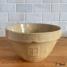 Load image into Gallery viewer, Rare find! Vintage early 20th century yellow ware mixing bowl featuring a homestead scene of girl with watering can. Crafted by Robinson Ransbottom, USA, 1930s. A well-crafted piece of stoneware offering a nostalgic vibe to your farmhouse or cottage kitchenware and decor!

In excellent condition, no chips/cracks/repairs, age-related crazing. Marked and 166-7 U.S.A.

Measures 7 x 4 inches
