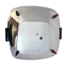 Load image into Gallery viewer, Underside of Glo-Hill Gourmates chrome tidbit tray showing the polished chrome base, central screw fitting, original Gourmates by Glo-Hill Canada foil label, and four amber Bakelite bullet feet
