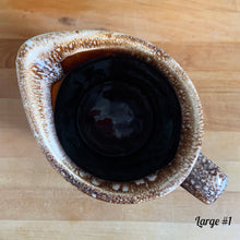 Load image into Gallery viewer, Vintage glossy brown drip glazed ceramic pitcher. Crafted by Hull Pottery, USA, 1960s. A beautiful piece to add to your home decor or art pottery collection!

In excellent condition, no chips/cracks/repairs. Maker&#39;s marks.

Measurements

Large: 5 x 9 inches, 72 ounces
