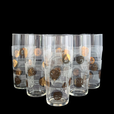 Vintage set of six clear glass tumblers featuring European gold coins superimposed on horizontal bands of white stripes. Circa 1960s. These unique glasses will make a great addition to your barware collection!  In excellent condition, no chips.  Measures 2 1/2 x 5 3/4 inches  Capacity 11 ounces