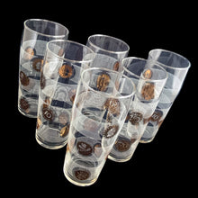 Load image into Gallery viewer, Vintage set of six clear glass tumblers featuring European gold coins superimposed on horizontal bands of white stripes. Circa 1960s. These unique glasses will make a great addition to your barware collection!  In excellent condition, no chips.  Measures 2 1/2 x 5 3/4 inches  Capacity 11 ounces
