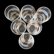 Load image into Gallery viewer, Vintage set of six clear glass tumblers featuring European gold coins superimposed on horizontal bands of white stripes. Circa 1960s. These unique glasses will make a great addition to your barware collection!  In excellent condition, no chips.  Measures 2 1/2 x 5 3/4 inches  Capacity 11 ounces
