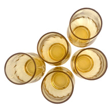 Load image into Gallery viewer, Vintage gold honey Regal 6oz flat glass tumbler featuring an swirl optic pattern. Crafted by Anchor Hocking, USA, 1970s. A lovely addition to your everyday drinkware or barware collection!

In excellent vintage condition, no chips.

Measures 2 1/2 x 3 5/8 inches

Capacity 6 ounces
